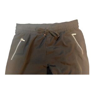 Calvin Klein black dress wind pants! With silver zipper pockets! No snags!